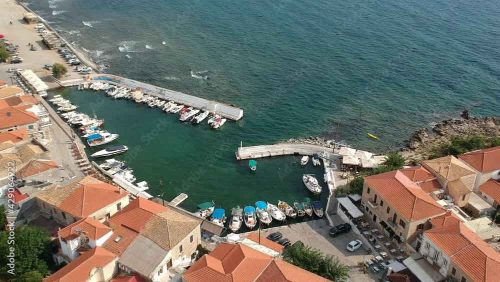 Aerial scenic view over the seaside village Agios Nikolaos and the picturesque old port in Messinia, Greece Aerial scenic view over the seaside village Agios Nikolaos and the picturesque old port in Messinia, Greece