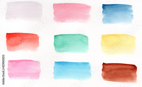 Multicolored brush strokes of watercolor paint. Colored banners set with watercolors.