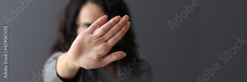 Tableau sur toile Woman shows negative gesture with her hand.