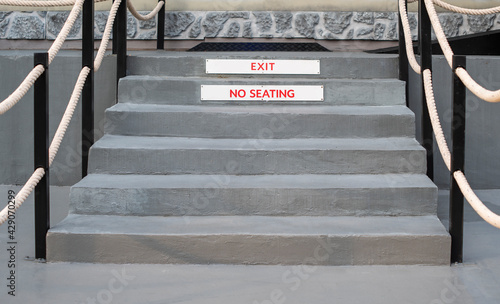 Fotografia Exit and No Seating walkway stairs outdoor and background photo stock