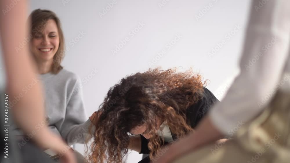 Close up women holding each others hands during group therapy, psychotherapy concept. Womens support circle Close up women holding each others hands during group therapy, psychotherapy concept. Womens support circle