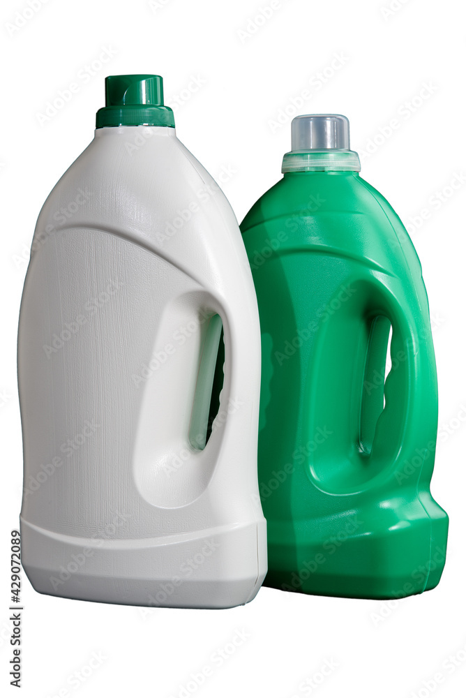 Two blank bottles of laundry detergent, fabric softener or cleaning agent isolated on white background. Plastic white and green bottles. Space for branding. Mockup.