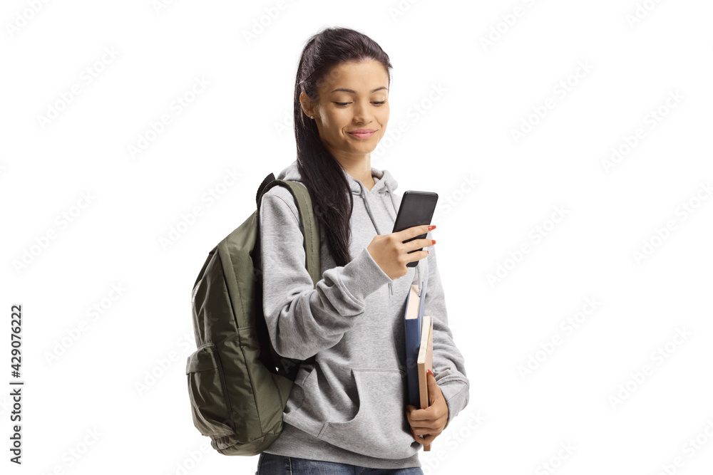 Mixed race female student with books and mobile phone Mixed race female student with books and mobile phone