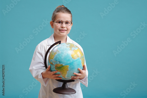 Little girl with world globe