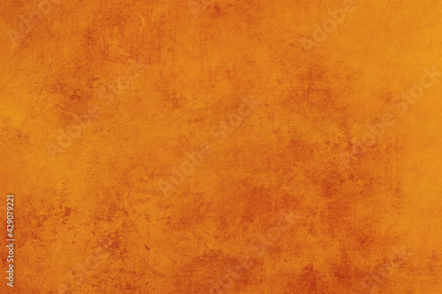 Worn out orange grungy backdrop