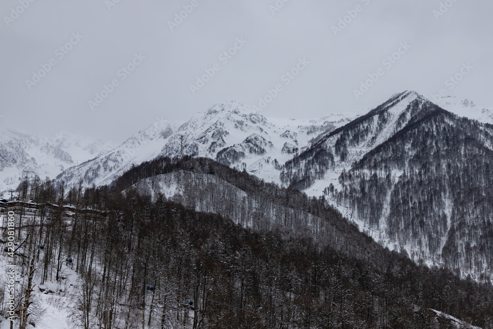 View of the mountain range at cloudy day from the Olympic Village in Krasnaya Polyana, Sochi