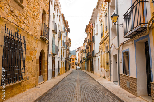 Fototapeta Naklejka Na Ścianę i Meble -  Atzeneta del Maestrat, Castellon province, Valencian Community, Spain. Beautiful historic street. Traditional and typical spanish village.