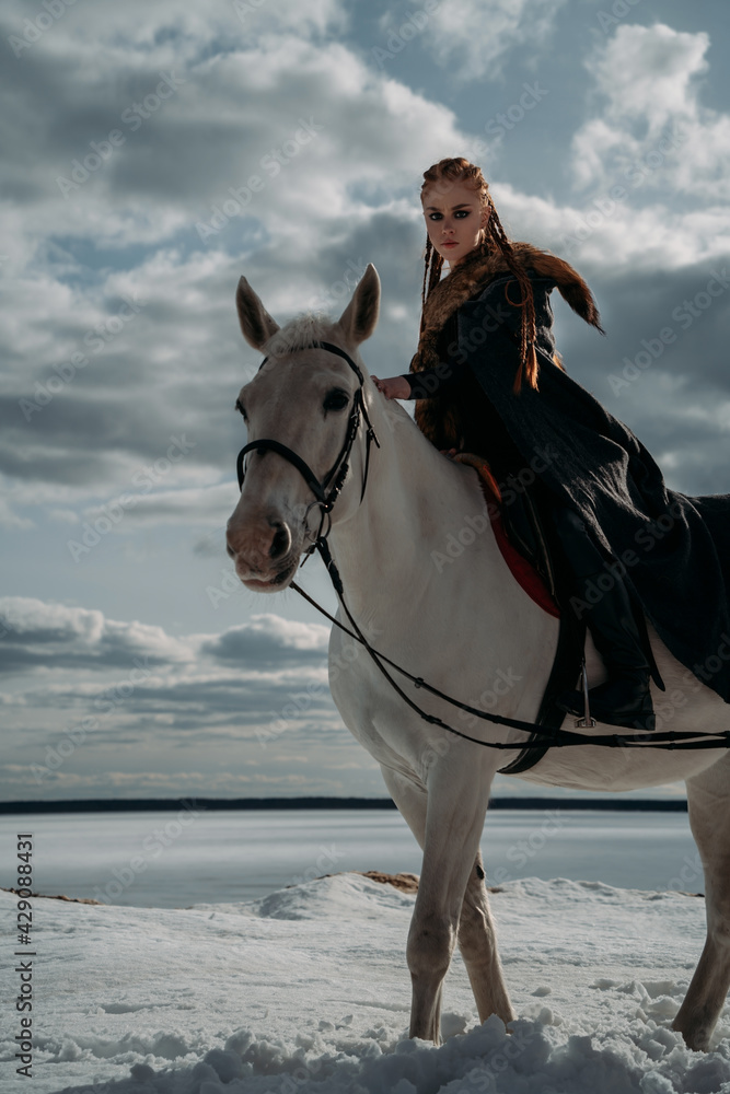 Young viking woman with red hairs ride a horse. Dramatic light. Role-playing game