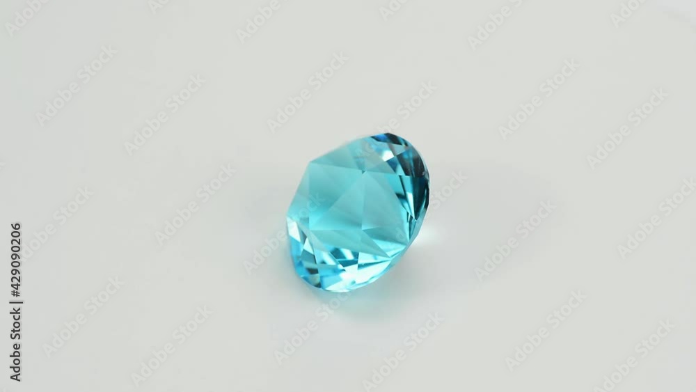 Natural swiss sky blue topaz. Round custom Russian cut, faceted, loupe clean - VVS,IF,FL. Heated, treated, irradiated, color enhanced. Full of sparkle semiprecious gemstone white background Natural swiss sky blue topaz. Round custom Russian cut, faceted, loupe clean - VVS,IF,FL. Heated, treated, irradiated, color enhanced. Full of sparkle semiprecious gemstone white background