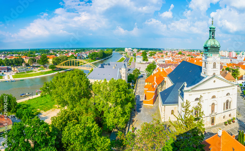 Panoramatic view of the hungarian city gyor with the roman cathedral, Carmelita Church and raba river photo