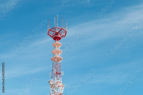 telecommunication tower against the blue sky. 5G tower