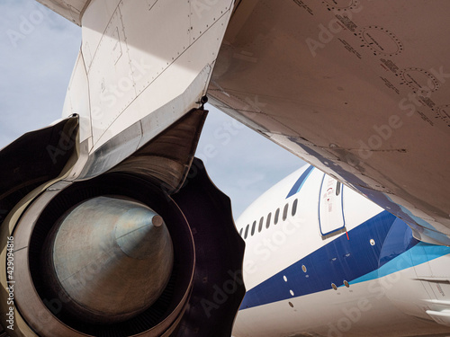 Turbofan engine under wing of passenger widebody aircraft