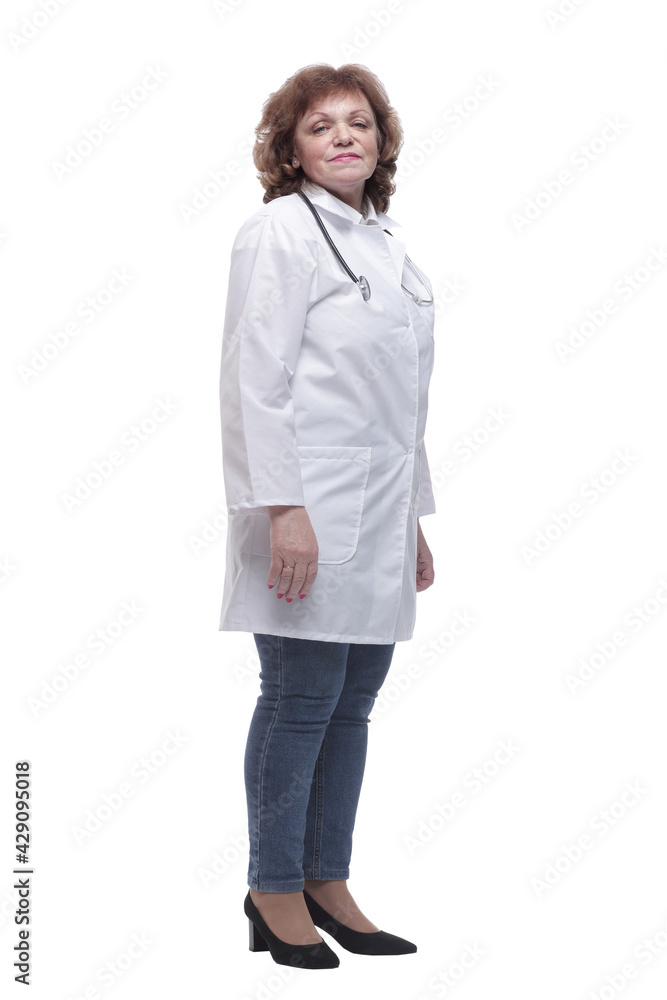 in full growth. qualified female doctor with a stethoscope in full growth. qualified female doctor with a stethoscope