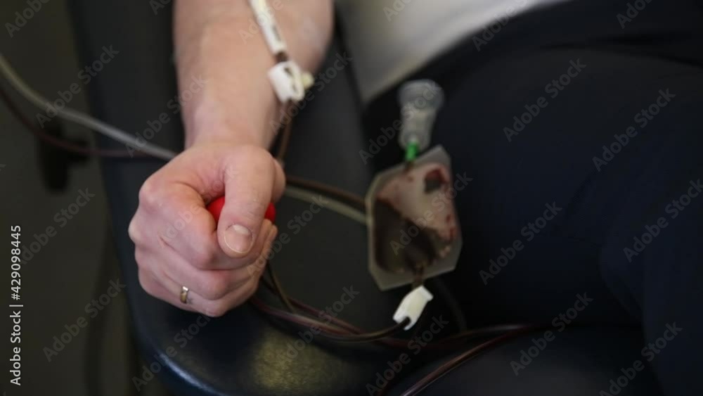 Volunteers donate blood at a modern donor center Volunteers donate blood at a modern donor center