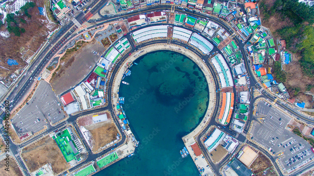 Sokcho, South Korea, 2016 - Sokcho Fish Town. View from above. Round bay of the sea city of Sokcho. Fish breaks are around the sea area.