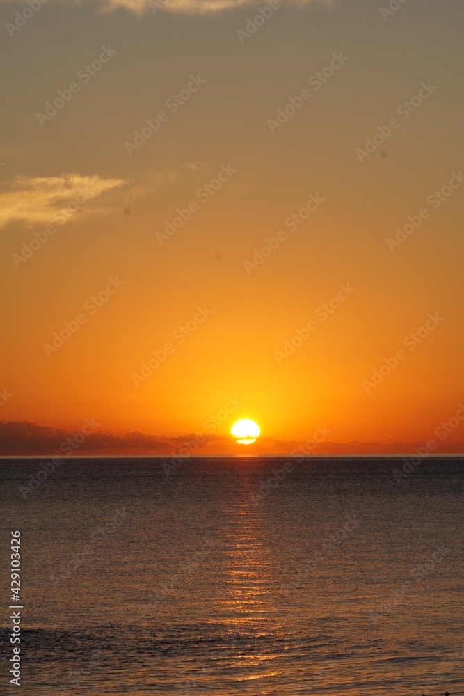 Sunrise over the calm sea