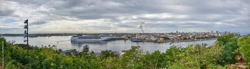 Cuba. Havana. Harbor panorama with passenger cruise ship from Christ Park