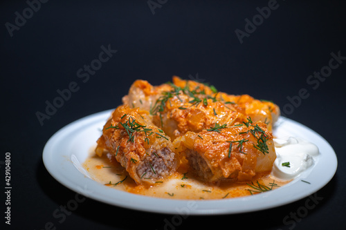 traditional Ukrainian stuffed cabbage rolls, according to a home recipe in a form or plate