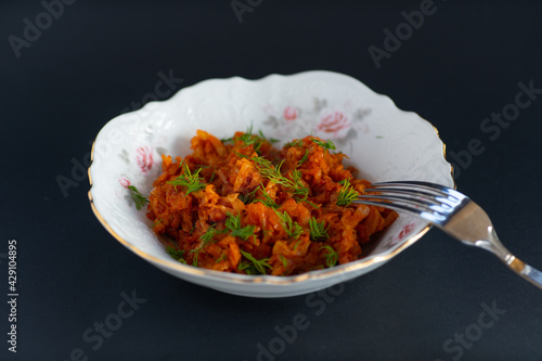 stewed ukrainian cabbage dish on a plate photo