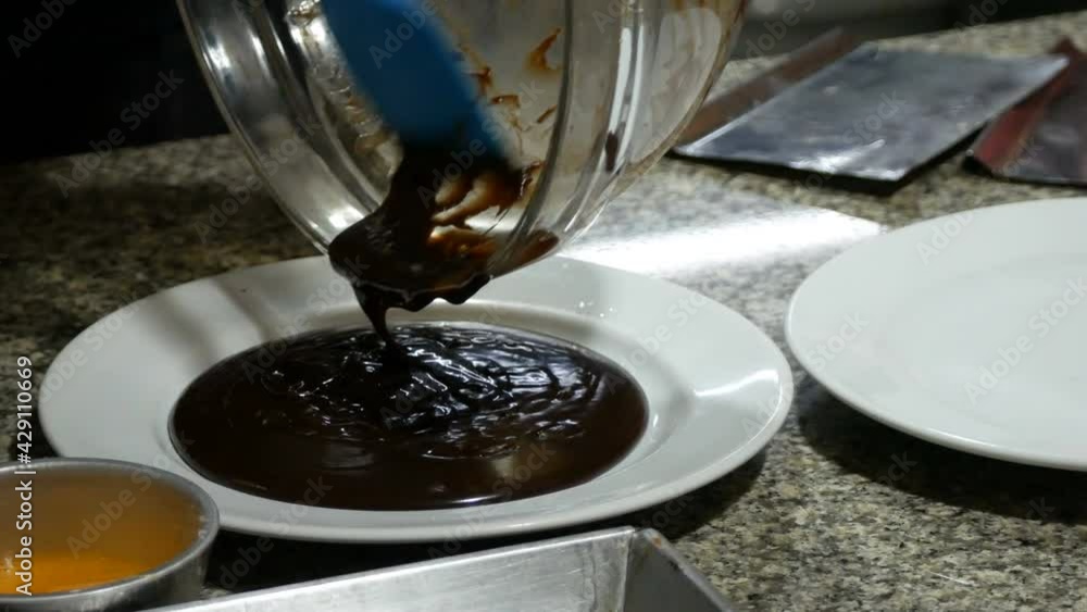 chocolate cream sauce on tray waiting for baking cake chocolate cream sauce on tray waiting for baking cake