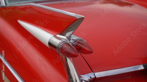 Back of luxury red retro car photo