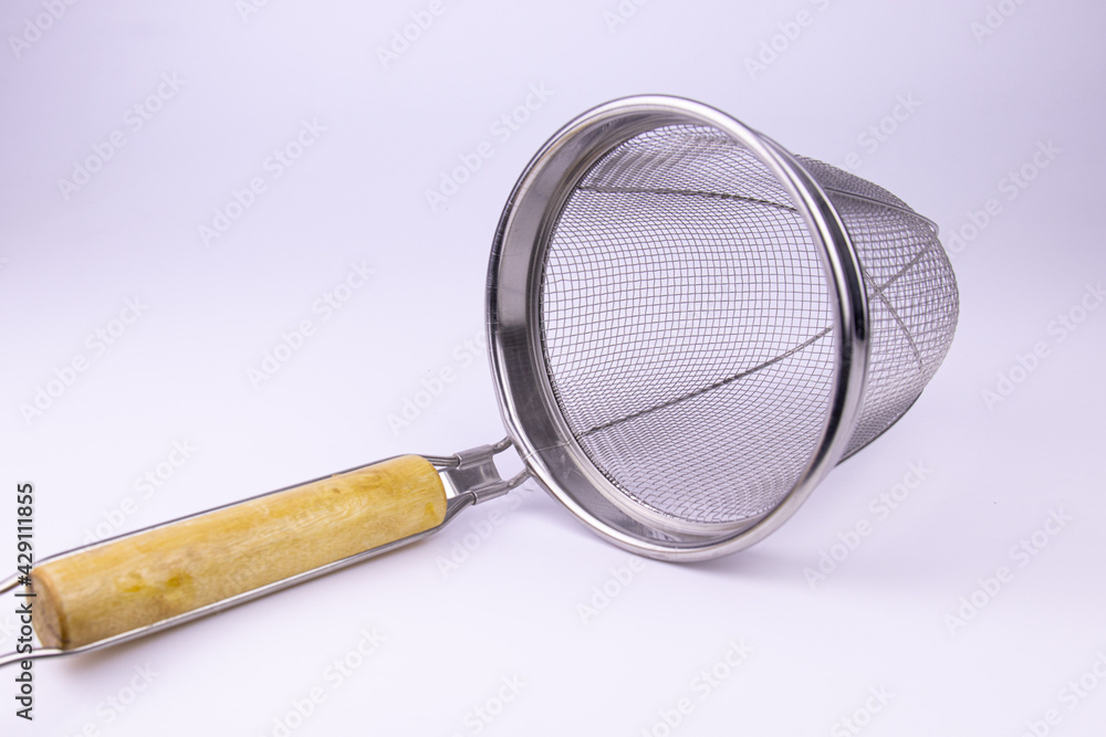 Mesh Strainer Colander on white background Mesh Strainer Colander on white background