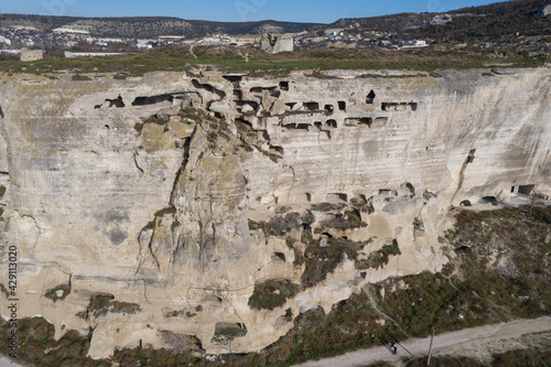 Cave complex at the fortress of Kalamita in Inkerman. Caves in the mountains near the monastery. Old Crimean caves.