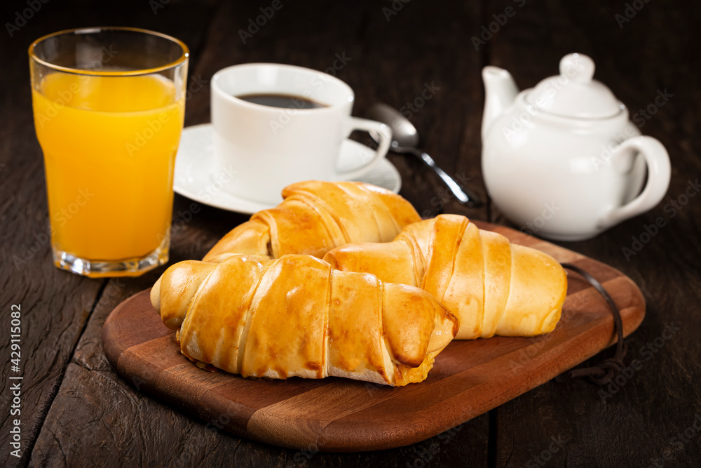 Traditional fresh baked croissants on the table. Traditional fresh baked croissants on the table.