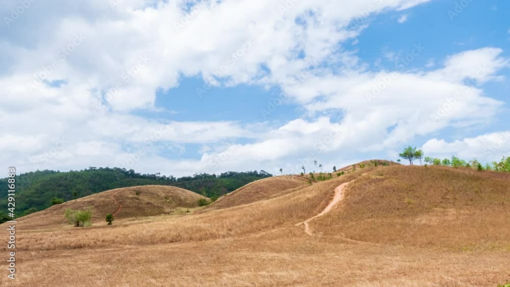 Golden Grass or Bald Hill mountain, scenic park in Ranong, Thailand; zoom out - Time Lapse Golden Grass or Bald Hill mountain, scenic park in Ranong, Thailand; zoom out - Time Lapse