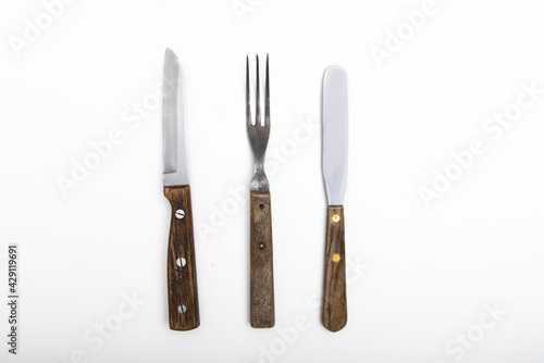 old cutlery on white background