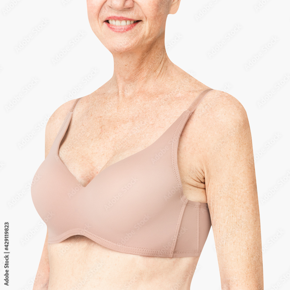 Senior woman in nude bra with design space Stock Photo