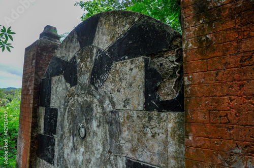 Monumental tomb of the wealthy Hossein family, built in the forest in La Digue Island photo