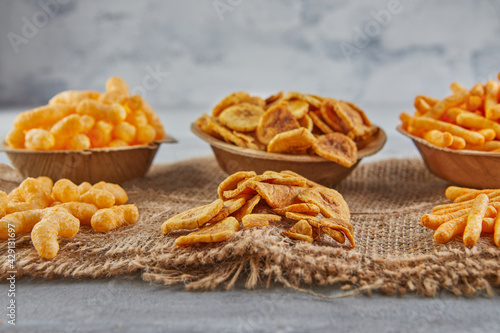 Banana chips are a healthy meal, and spiced corn puff snacks are great snack