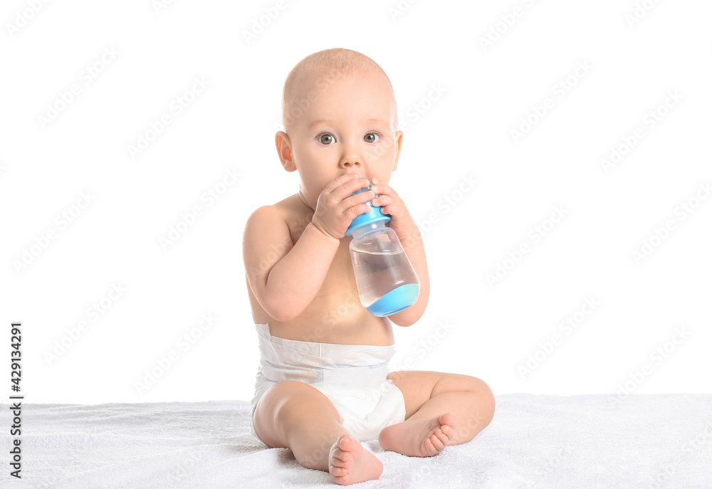 Cute little baby drinking water from bottle on white background Cute little baby drinking water from bottle on white background