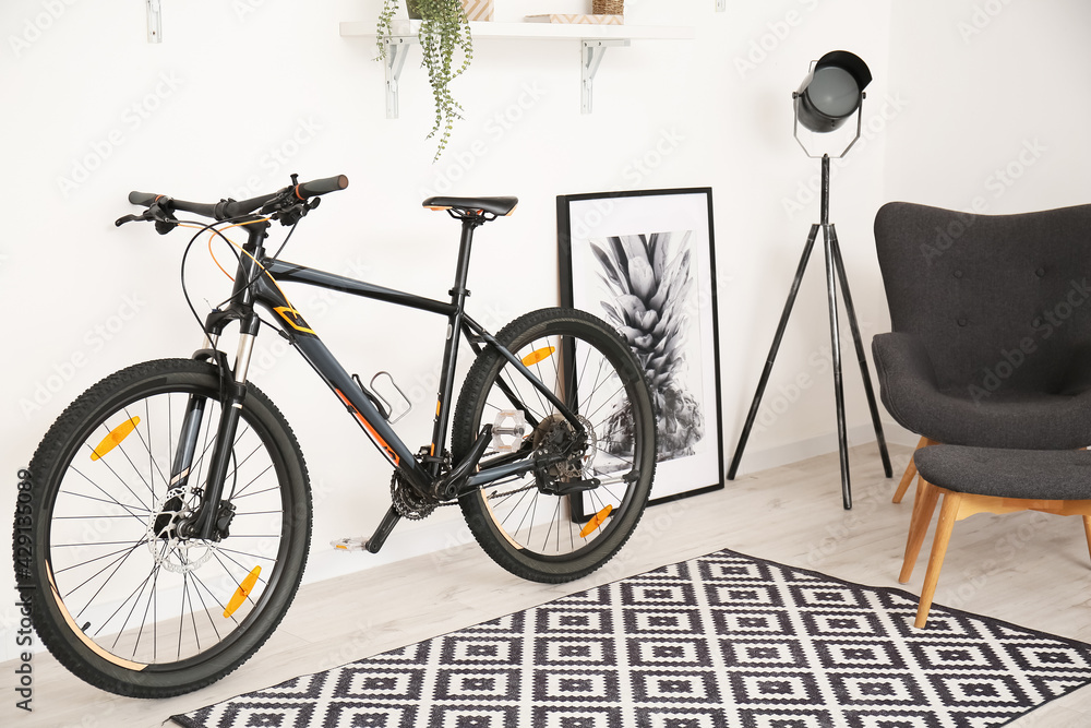 Bicycle in interior of modern room Bicycle in interior of modern room