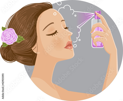 Beautiful girl delicately moisturizes skin with cosmetic toner or mist spray.