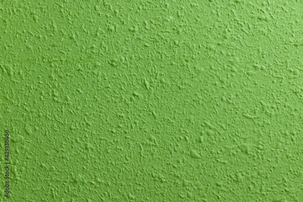 Fototapeta premium Fresh concrete wall in the construction site, green wall with cement floor, construction background renovation process, abstract