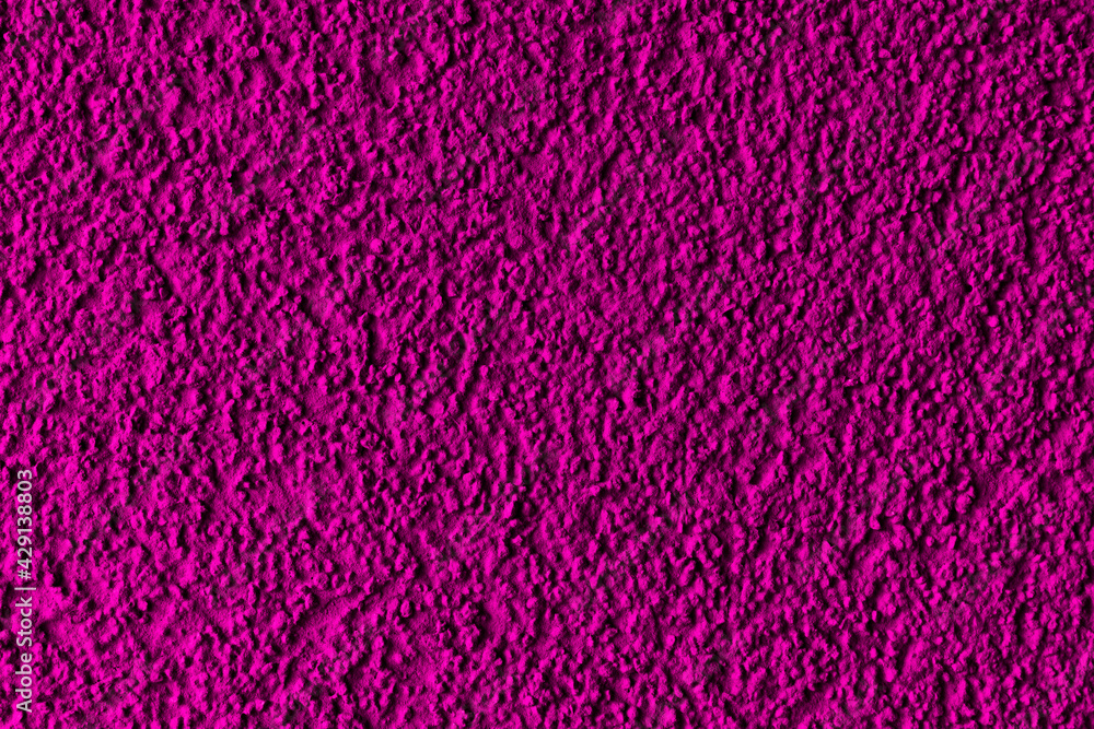 Pink plaster facade texture background. External facade of the building, plaster with clear texture. Pink plaster facade texture background. External facade of the building, plaster with clear texture.