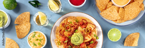 Mexican menu panorama with nachos and tequila, overhead flat lay