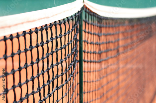 Tennis net on a court - shallof depth of field. photo