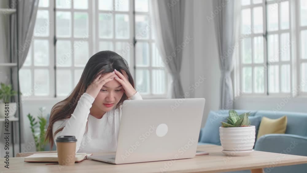 Tired Stressed Girl Working On Laptop Computer At Home Tired Stressed Girl Working On Laptop Computer At Home