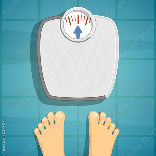 Human feet beside weighing scales