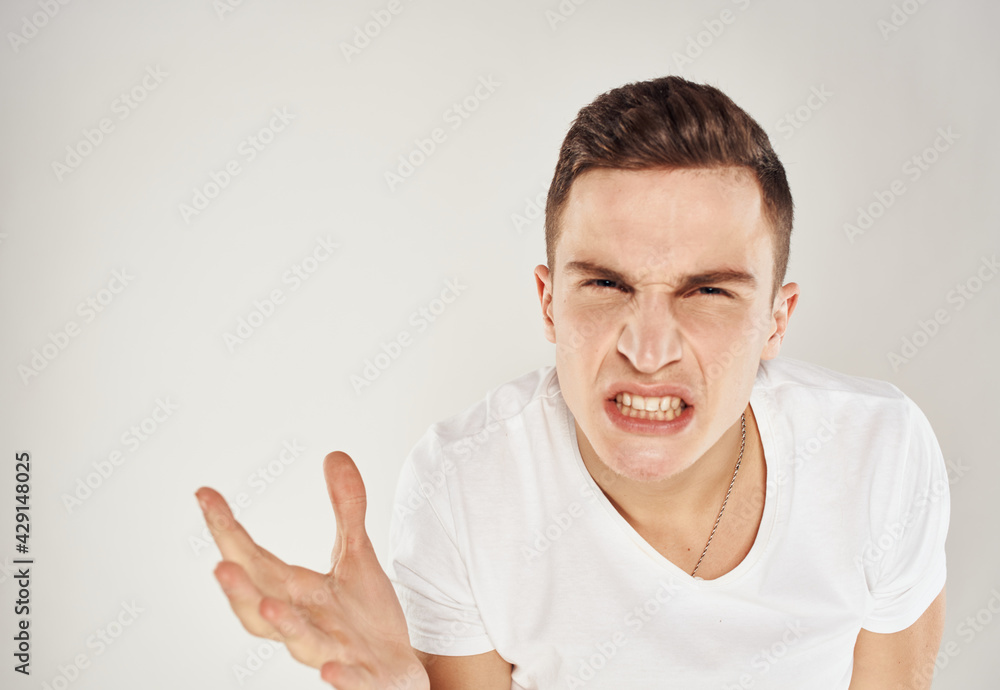 man gesturing with his hands indignant look light background cropped view Copy Space man gesturing with his hands indignant look light background cropped view Copy Space