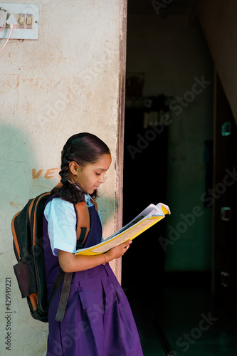 Indian school girl wearing school uniform