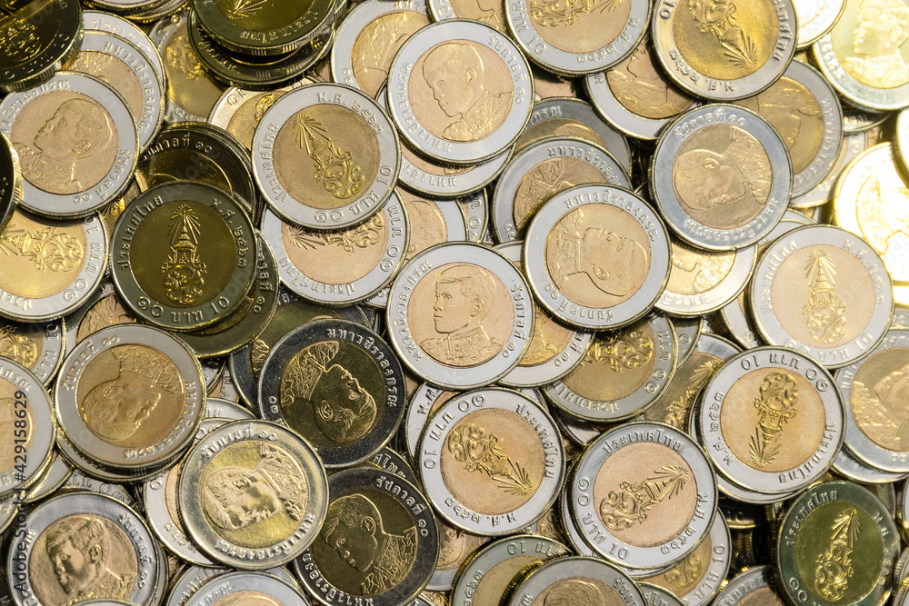 Stack of ten Thai baht coins, money, financial, business concept Stack of ten Thai baht coins, money, financial, business concept