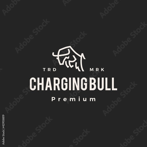 charging bull hipster vintage logo vector icon illustration