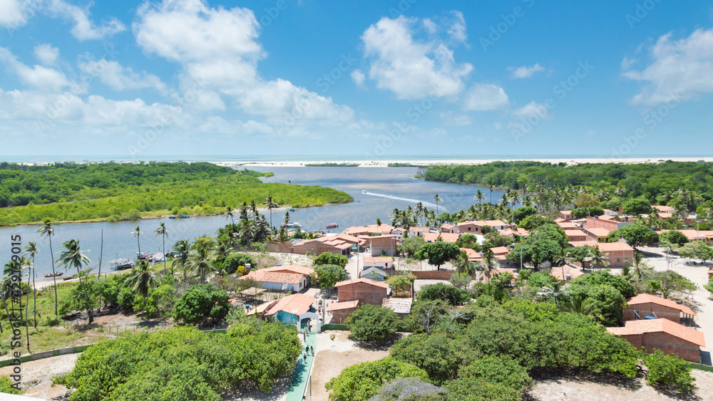 Aerial view of Atins, Brazil, in the region of Maranhao. Blue sky and white clodus in the background