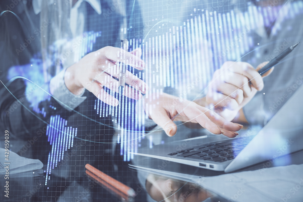Double exposure of man and woman working together and financial theme hologram. international business concept. Computer background. Double exposure of man and woman working together and financial theme hologram. international business concept. Computer background.