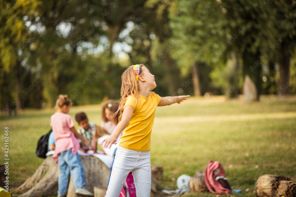 Girl dancing in the park.
