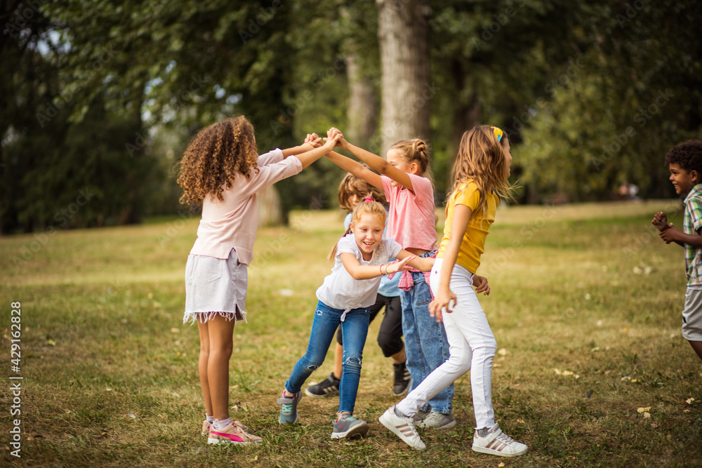 Fototapeta premium Happy kids in schoolyard.